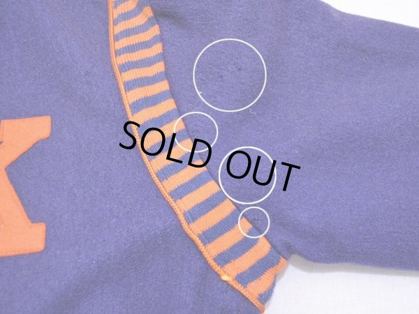 左袖付け根付近の虫食い