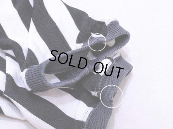 袖リブに小さなダメージ