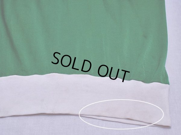 裾リブに薄らシミ汚れ