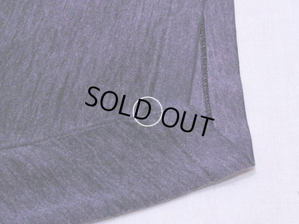 左袖口の小さなダメージ