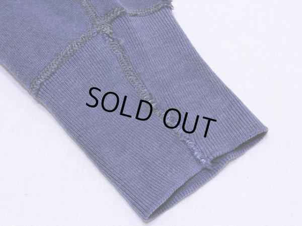 左袖リブにリステッチリペア跡