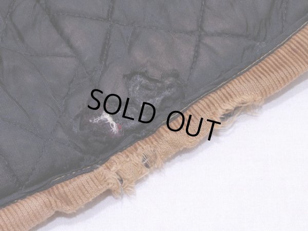 裾裏地にダメージ。