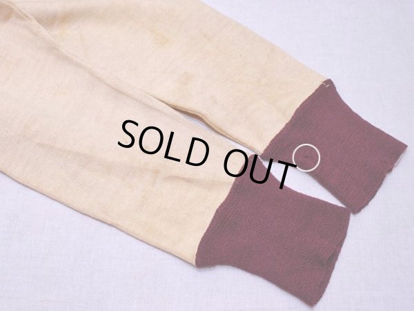 左袖リブに僅かなダメージ。