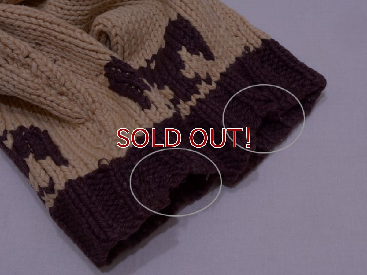 袖口に少々ホツレ。