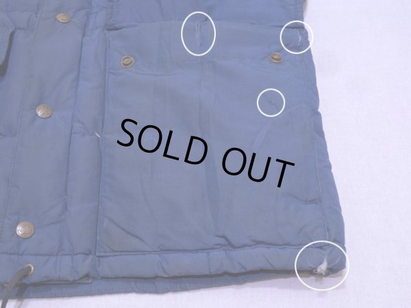 左裾ポケット付け根に多少の裂け、裾にダメージ。