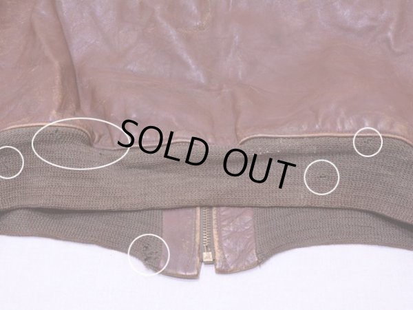 裾リブに少々虫食いダメージ。