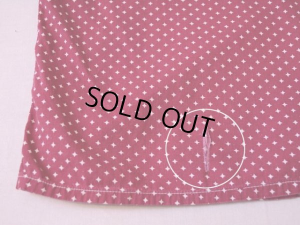 バック裾にダメージ。