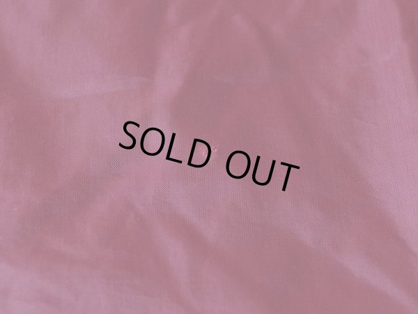 背中に小さな傷。