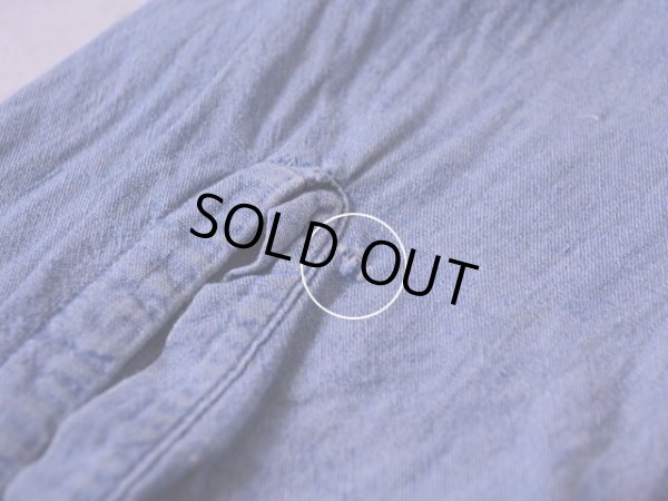 左袖口に僅かなダメージ。