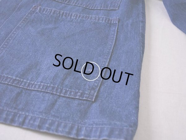 左裾ポケットに僅かなダメージ。