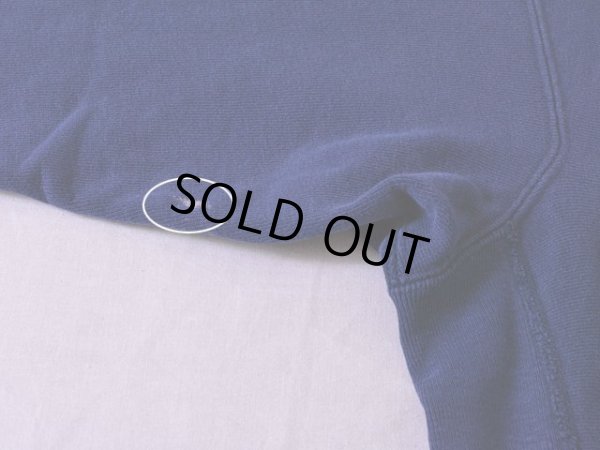 左袖に小さな色落ち。