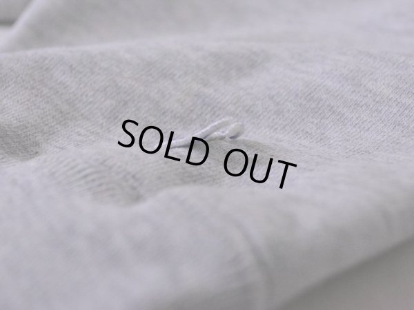 左袖口の目玉に少々剥がれ。