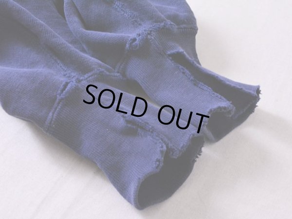 袖口・リブにダメージ。