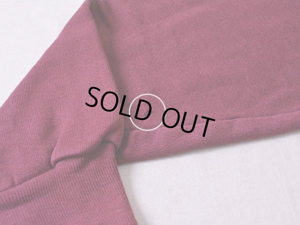 右袖に小さなダメージ。