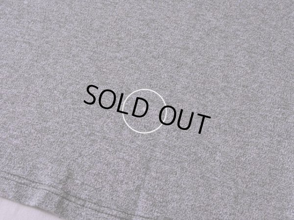 背中裾付近に僅かな色落ち。