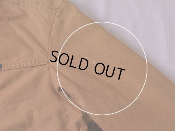 左袖に色落ちの様なもの。