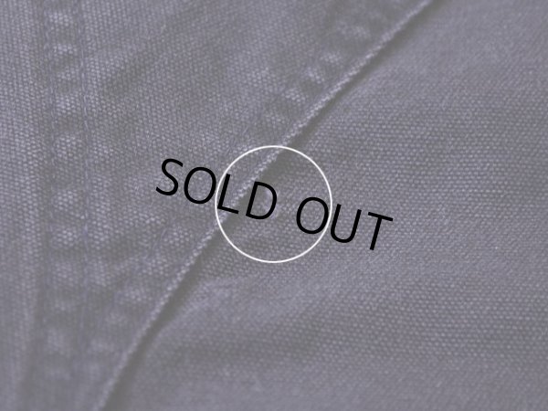 背中に僅かな傷。