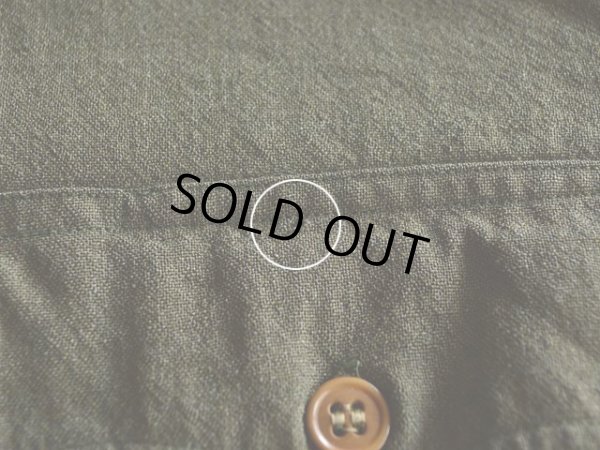 左胸ポケット付近に僅かな虫食い。