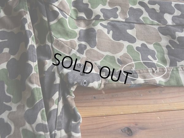 右袖に小さなダメージ。