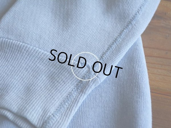 左袖リブ付け根に僅かなホツレ。