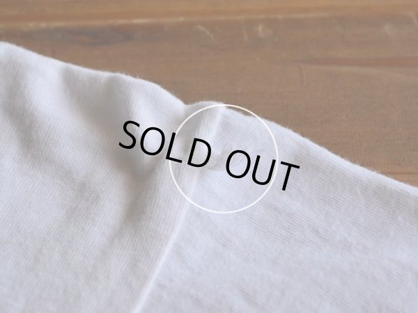 縫製時にできたと思われる生地のはみ出し。