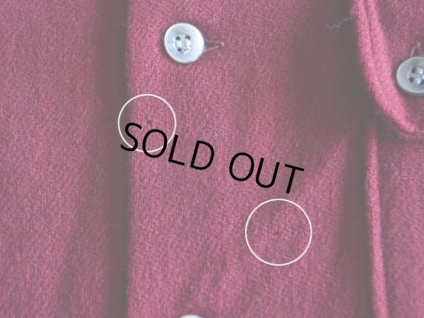 胸付近に僅かな虫食い。