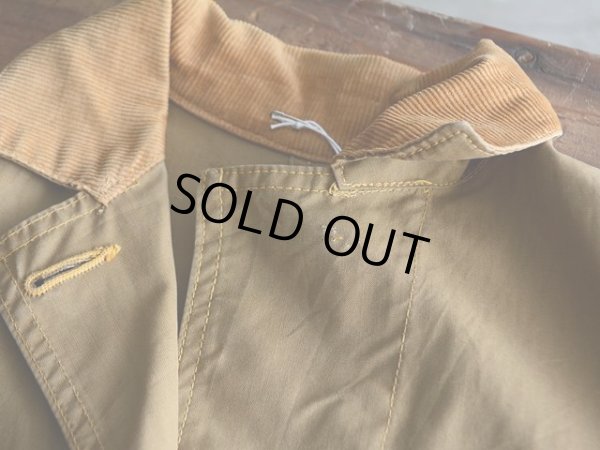 第一ボタン欠損。