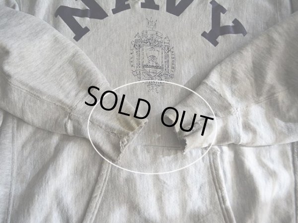 両袖リブにダメージ汚れ。