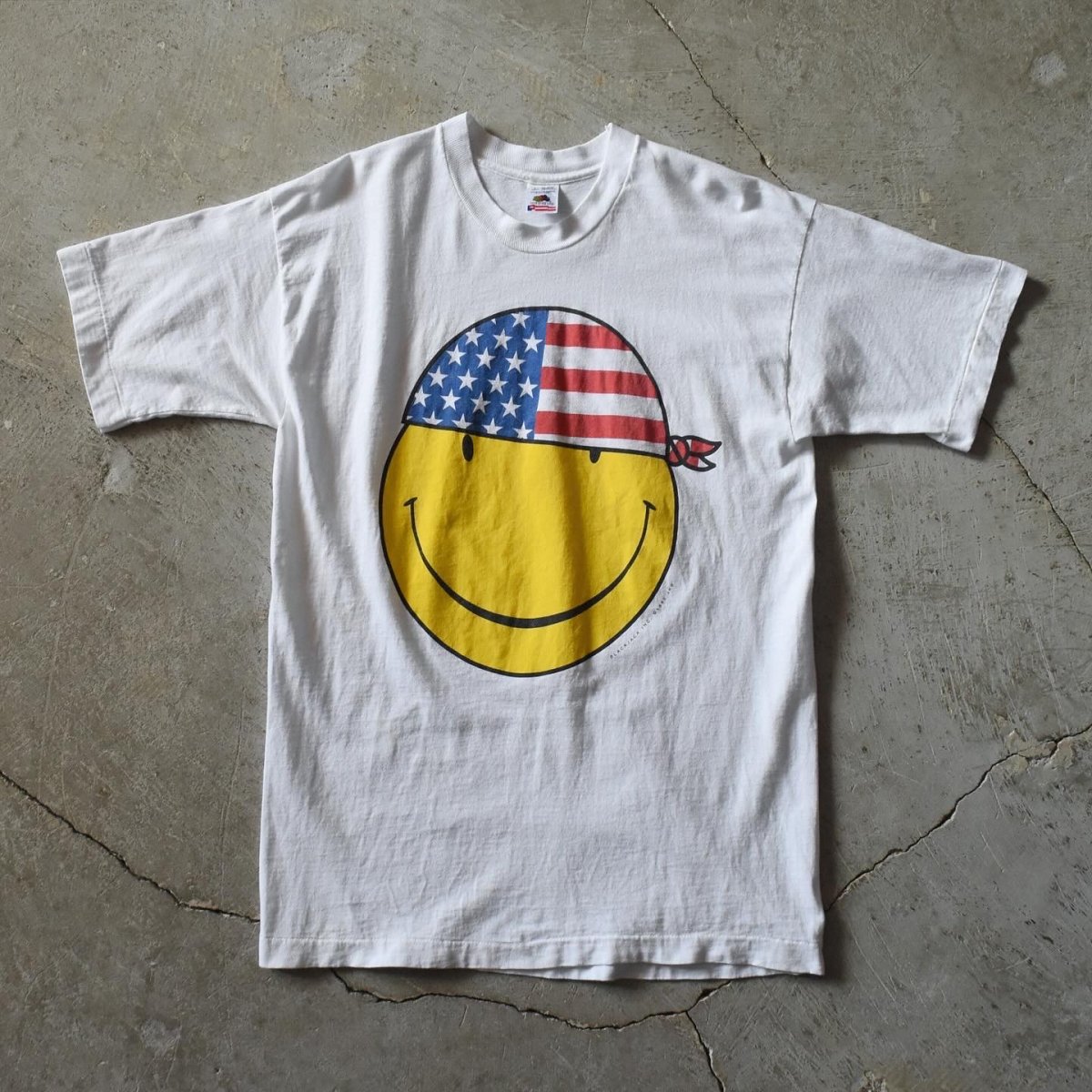 画像1: 1990s BLACKJACK INC. 星条旗スマイリー グラフィックTシャツ　 表記L  (1)