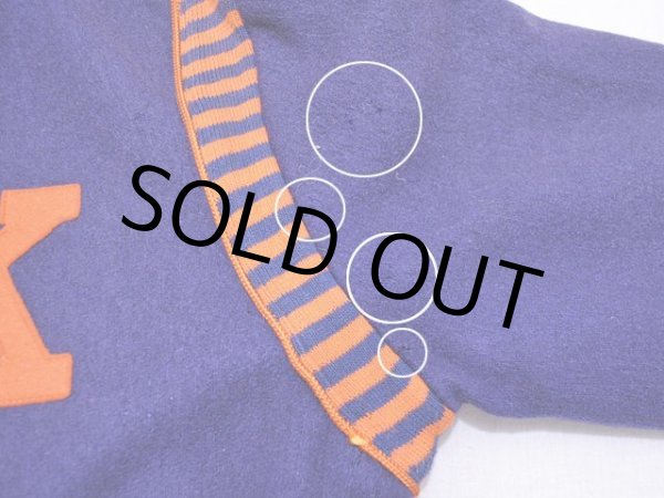 左袖付け根付近の虫食い