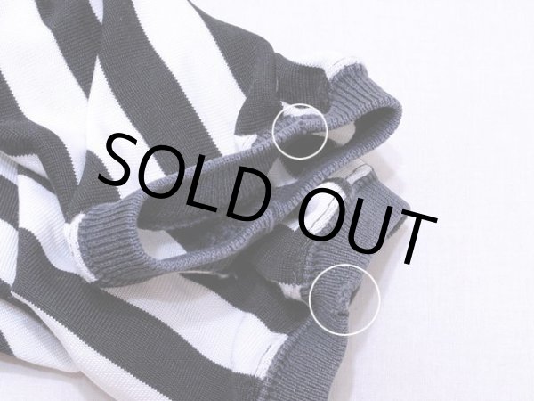 袖リブに小さなダメージ