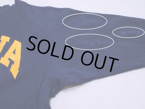 左袖に薄ら色落ちのようなもの。