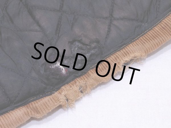 裾裏地にダメージ。