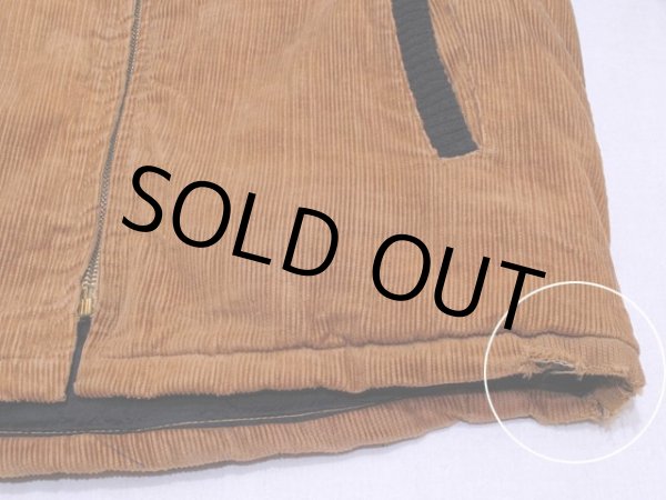 裾にダメージ。