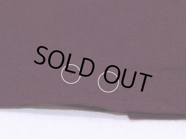 背中裾に多少の虫食い。