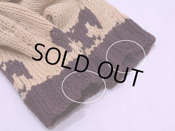 袖口に少々ホツレ。