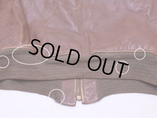 裾リブに少々虫食いダメージ。