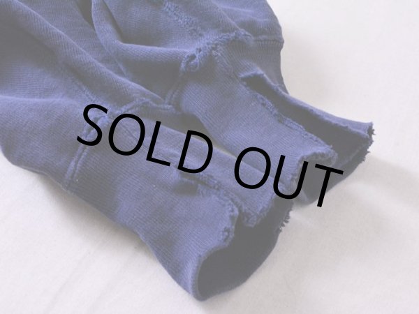 袖口・リブにダメージ。