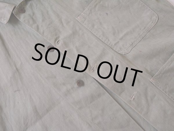 第四ボタン欠損。