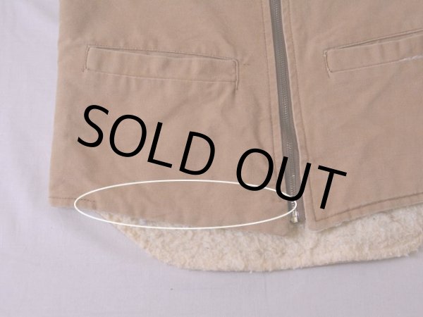 裾にステッチ抜け。