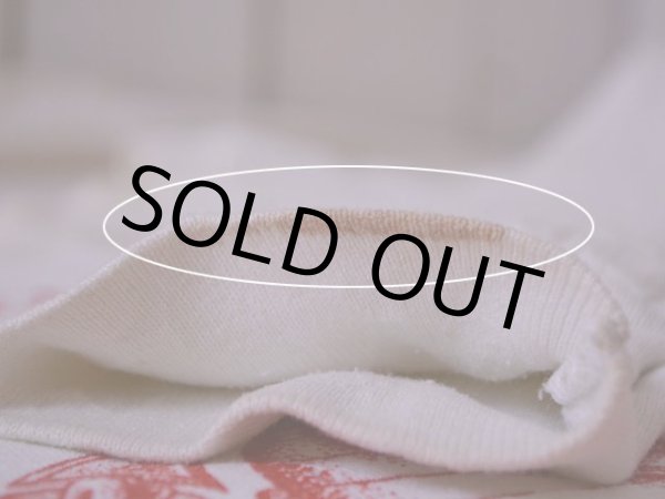 左袖リブに汚れ。