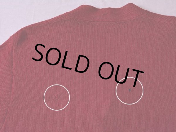 背中に虫食いとリペア跡。