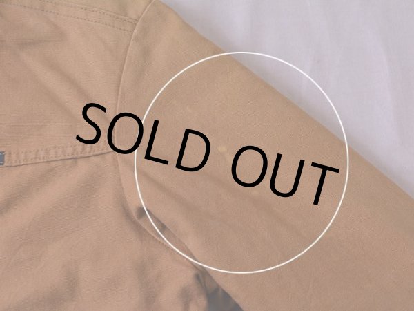 左袖に色落ちの様なもの。