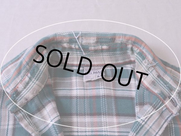 襟周りにスレ・ダメージ。