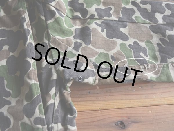 右袖に小さなダメージ。