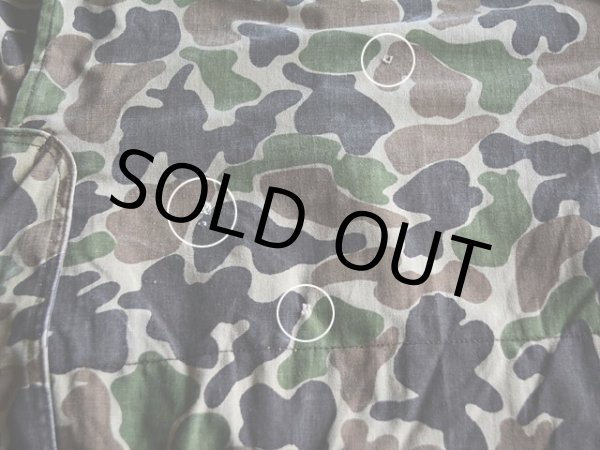 背中に小さな傷。