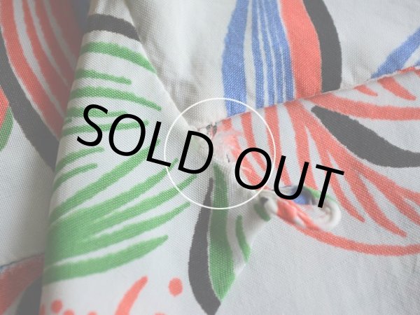 襟に少々ダメージ。