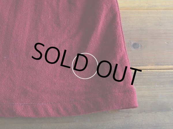 バック裾に小さな虫食い。