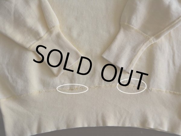 裾リブ付け根に少々ホツレ・リペア。