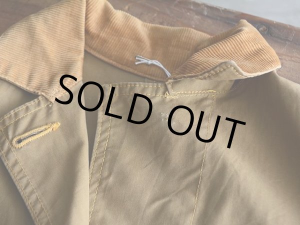 第一ボタン欠損。